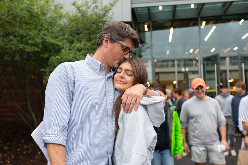 Father hugging daughter
