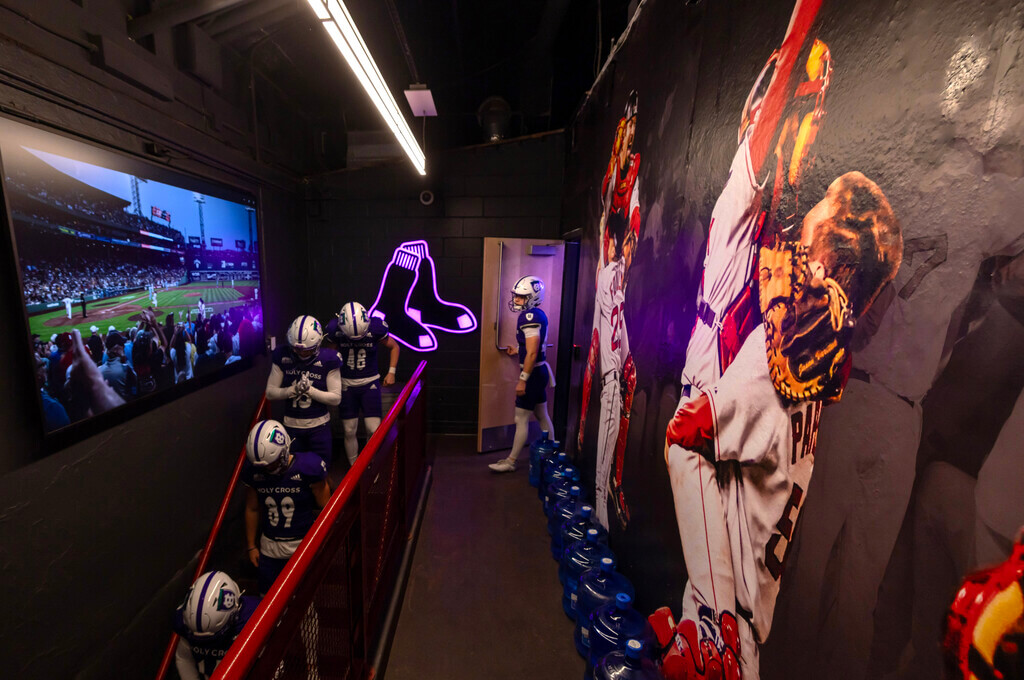 Holy Cross football player in Red Sox clubhouse