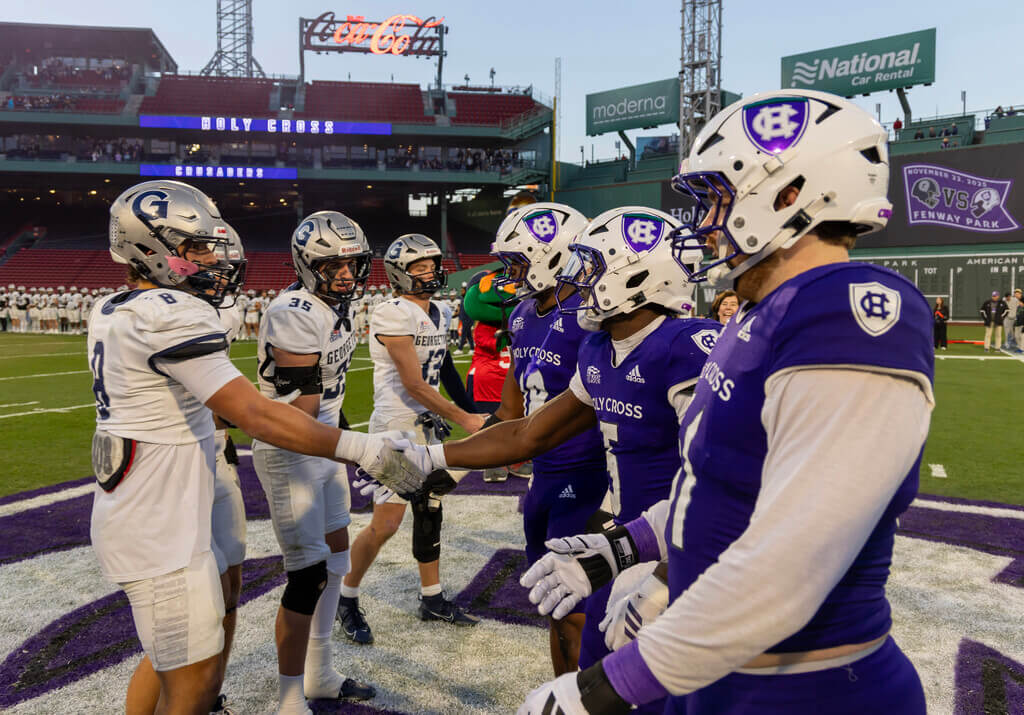 Georgetown and Holy Cross football players