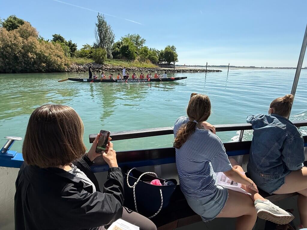 Students on a boat in the lagoon