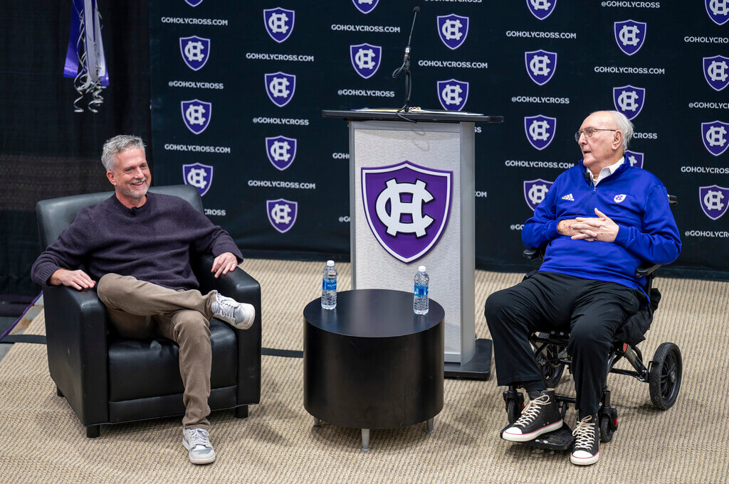 Two men in chairs talk