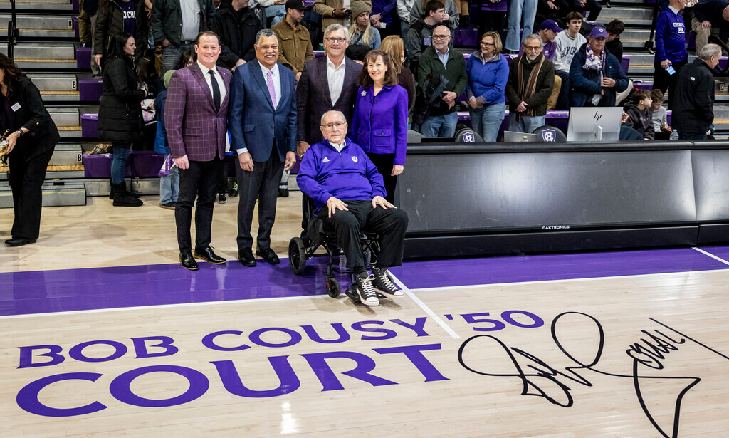 man in wheelchair next to basketball court
