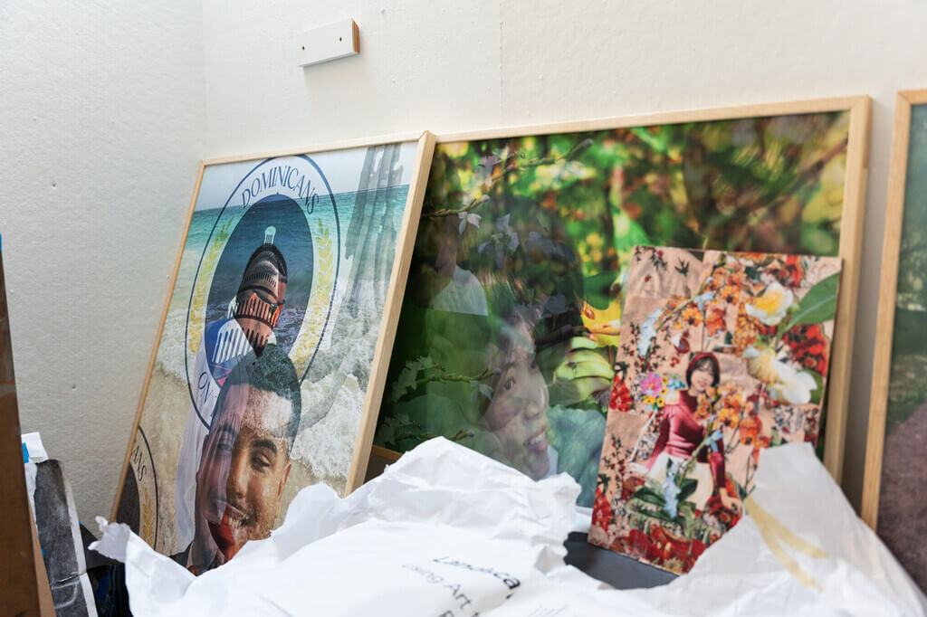 Three works of art leaning against a wall