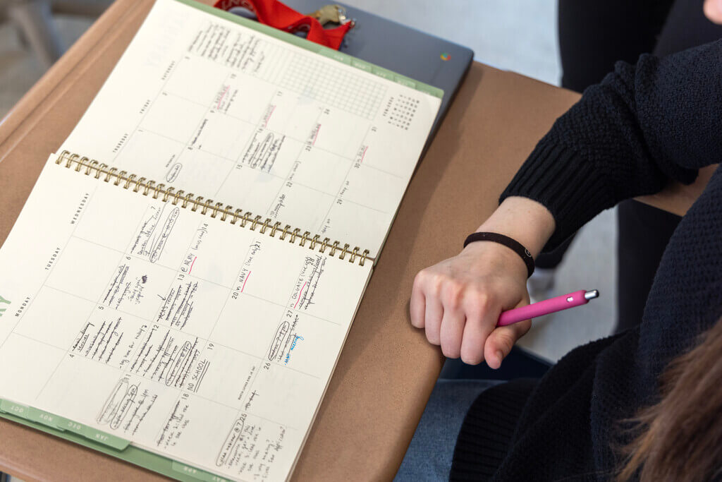 Planner open on a desk