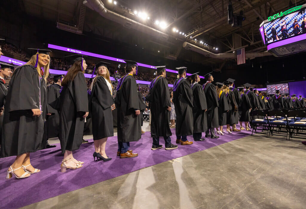Graduates processing in a line