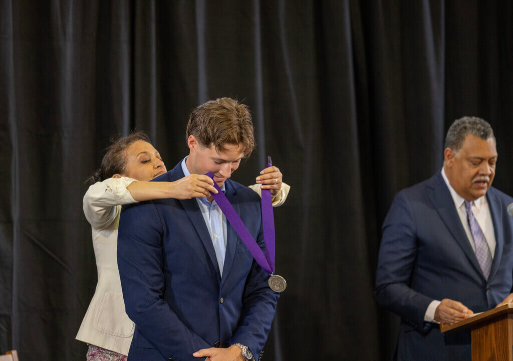 Person receiving a medal