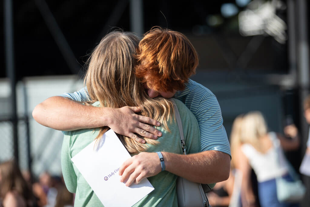 Mom and son hugging