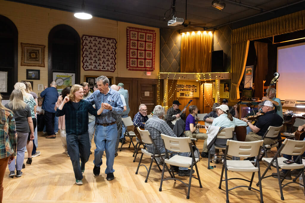 People dancing in a circle