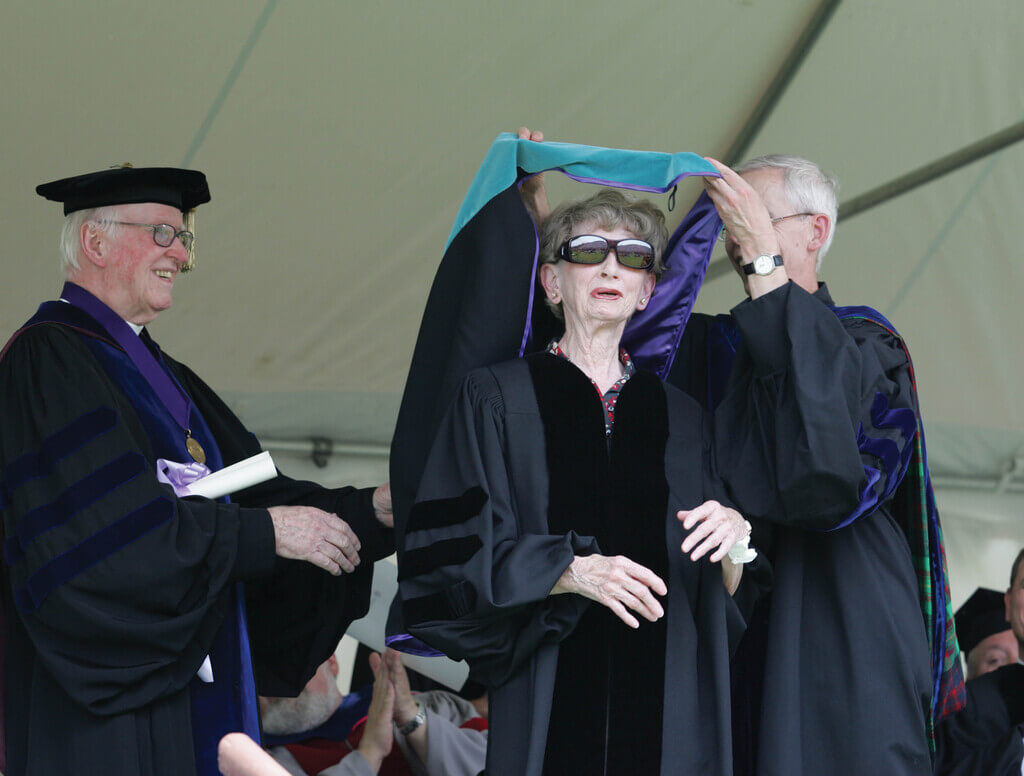 Annette Rafferty being hooded at commencement