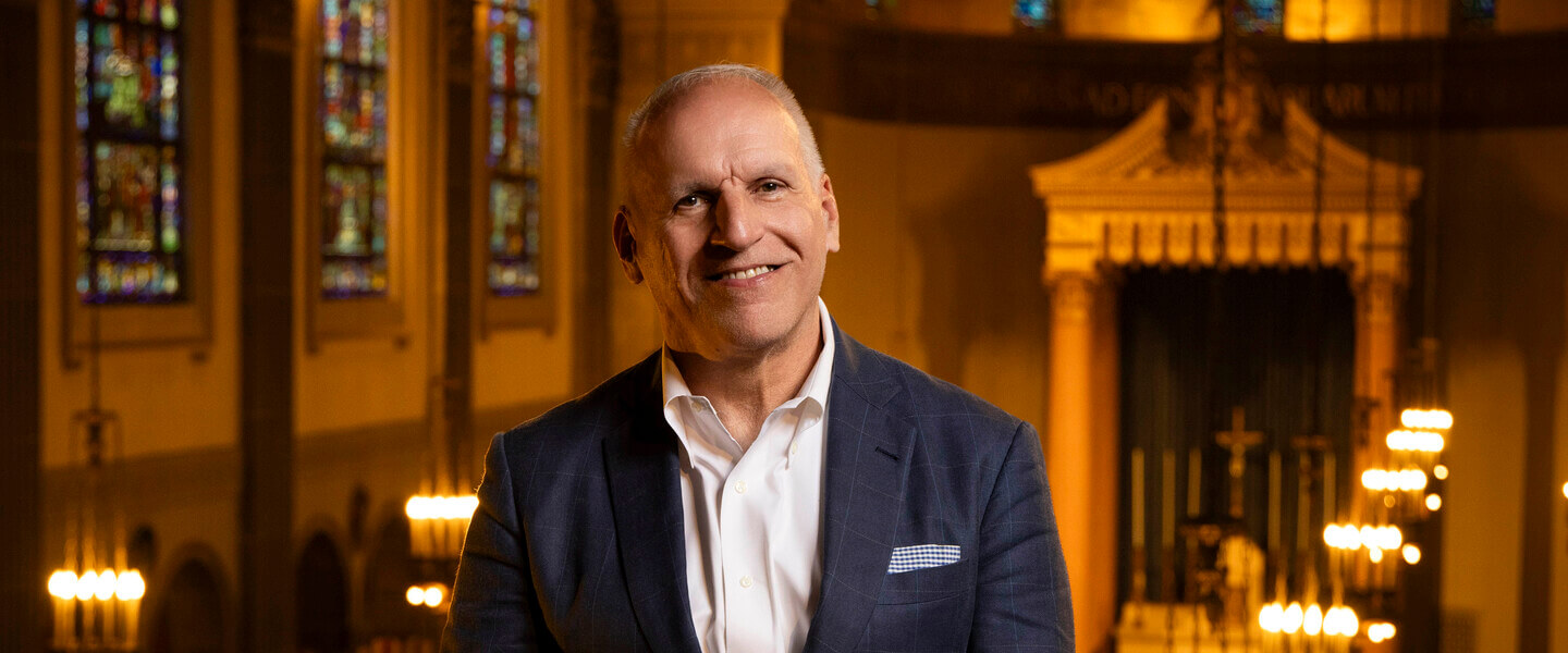 Man in the aisle of a church