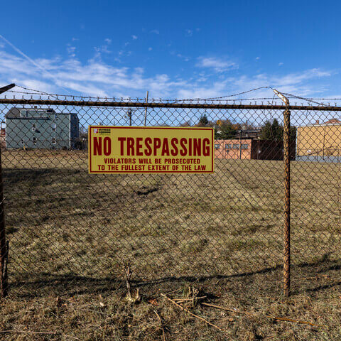 No trespassing sign at development site.