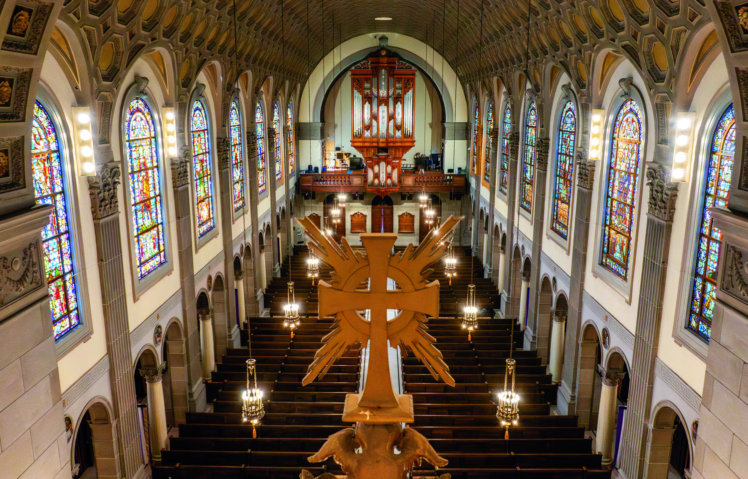 Photo of the inside of a church from a second floor.