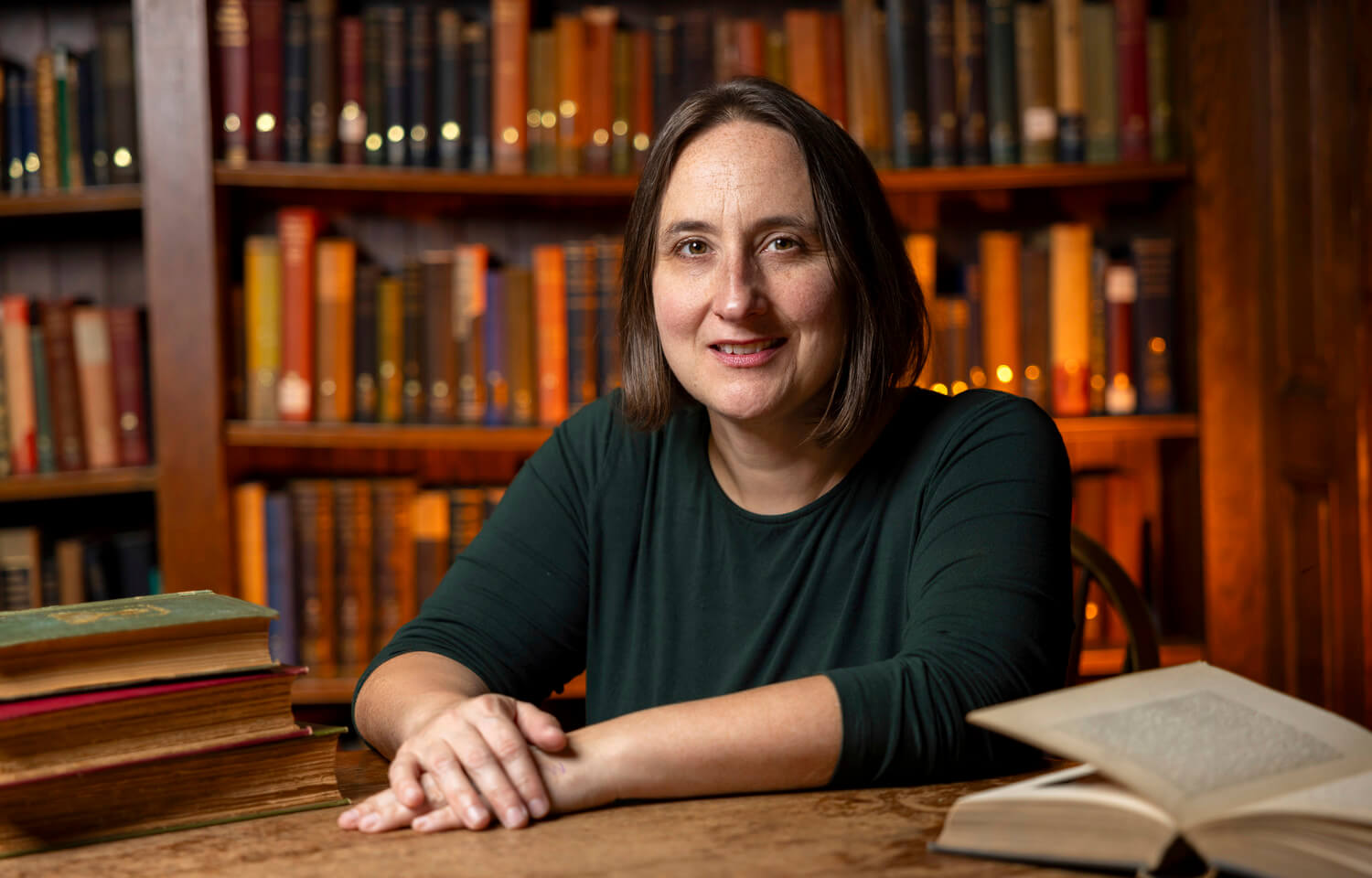Woman seated in library