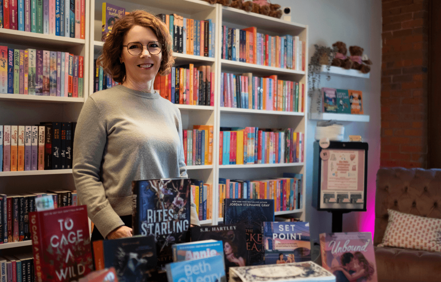 Paige Reynolds standing in a bookstore