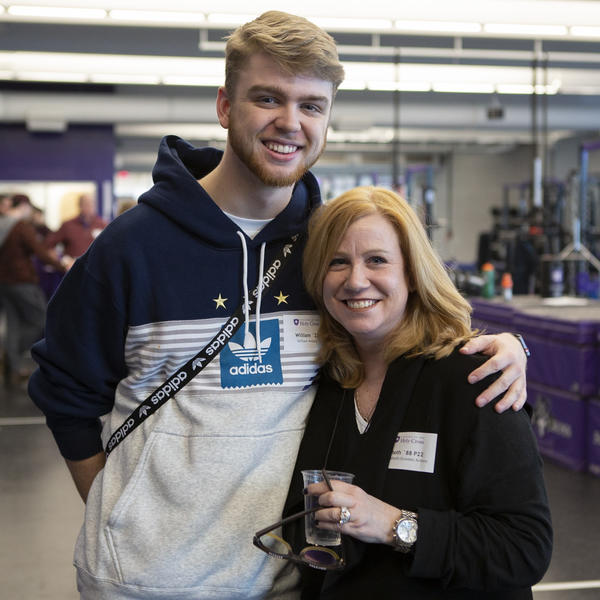 Beth Antony and her son at a Holy Cross event