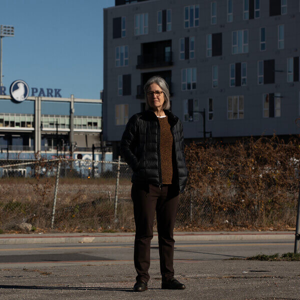 Woman in construction site/parking lot
