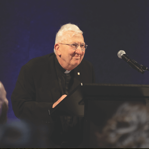 priest at podium