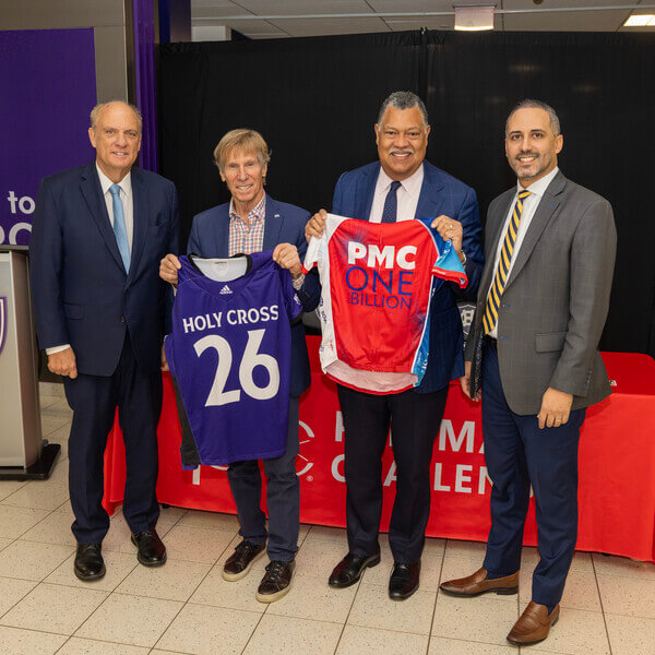 From left to right: Worcester Mayor Joseph M. Petty, PMC Founder and Chairman Billy Starr, Holy Cross President Vincent D. Rougeau and Worcester City Manager Eric D. Batista.