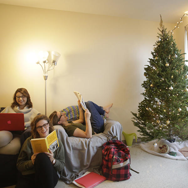 Laura Lopez '18, Emma Kuper '18 and Catherine Hershey '18 get back to studying after decorating their residence hall for Christmas.