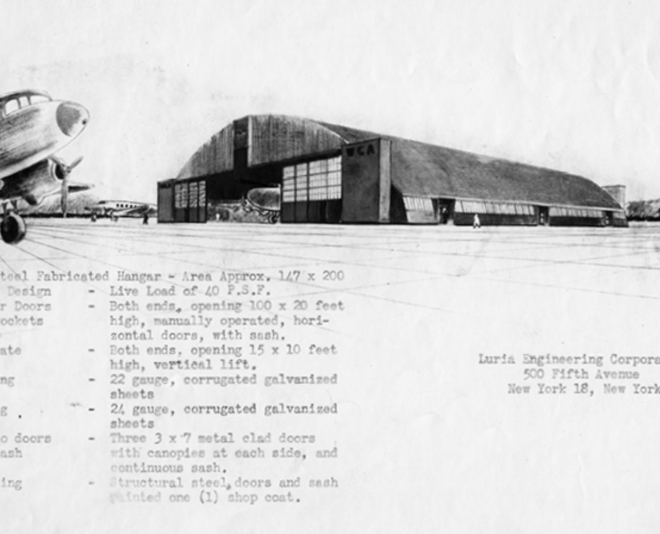 A vintage black and white photo showing an aircraft hanger with a airplane visible on the side