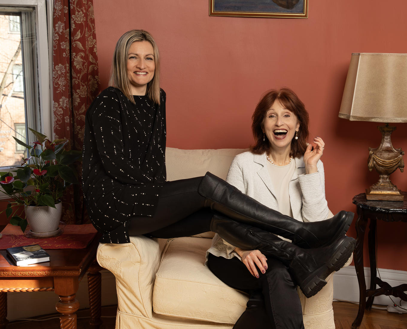 Two women sitting in a chair