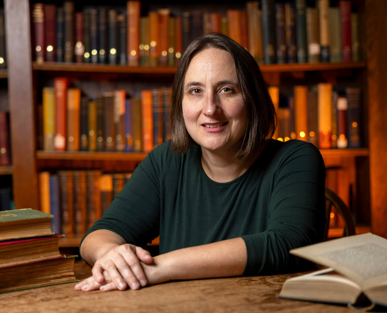 Woman seated in library