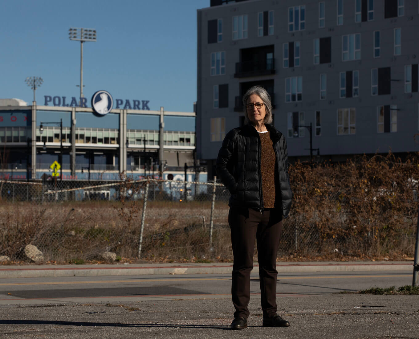 Woman in construction site/parking lot