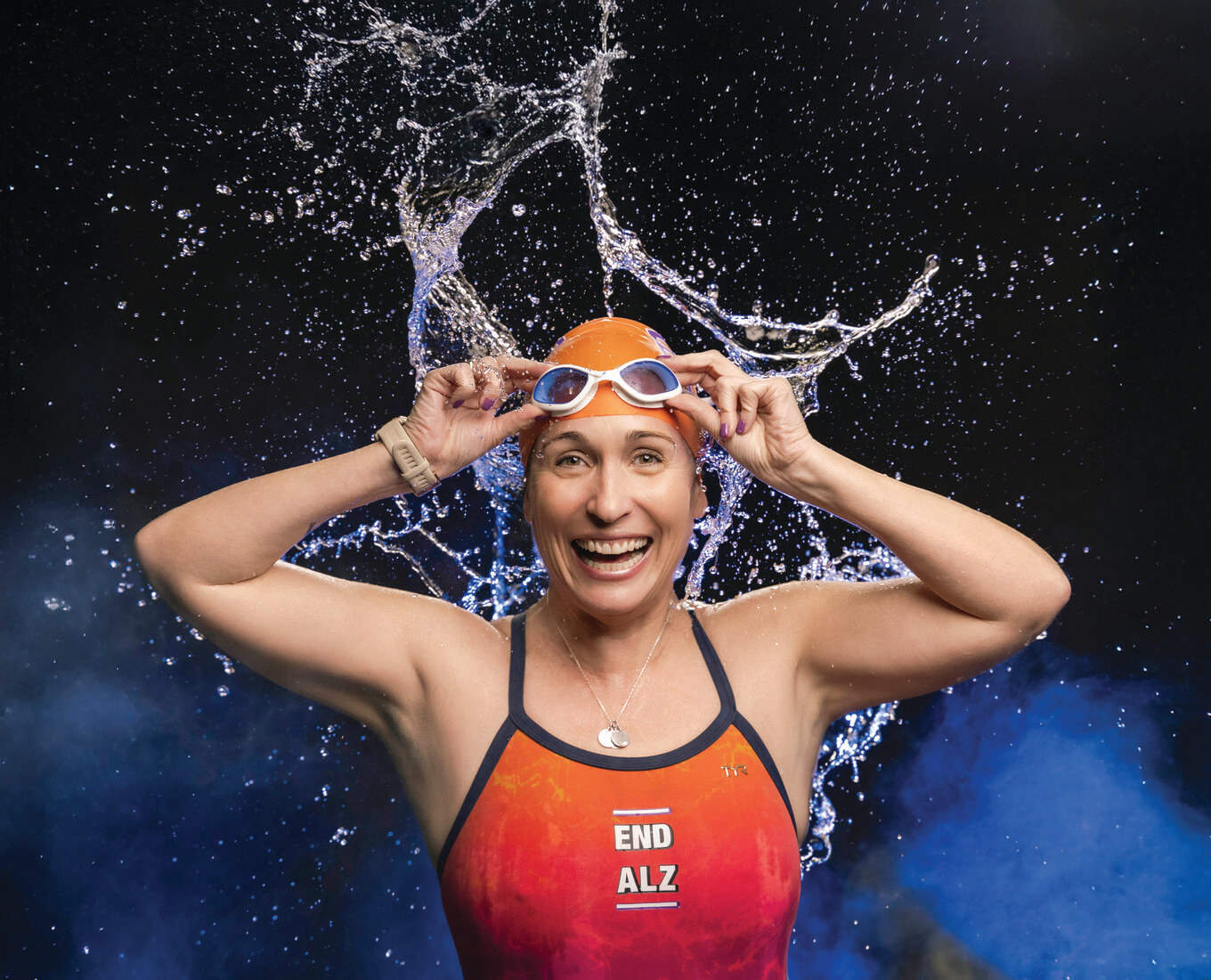 woman in swim cap and swimsuit