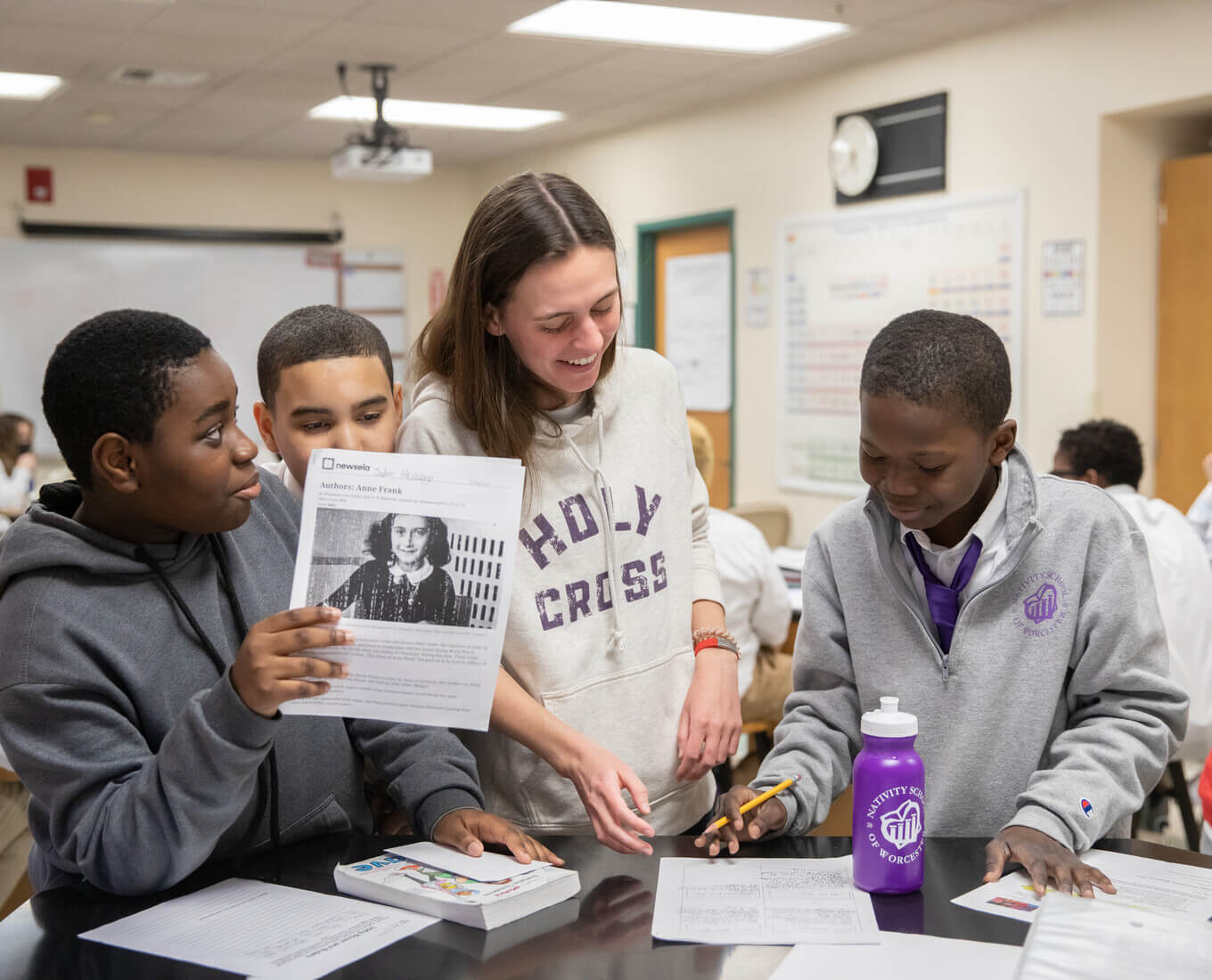 Holy Cross students volunteering at the Nativity School in Worcester, through the College's SPUD program