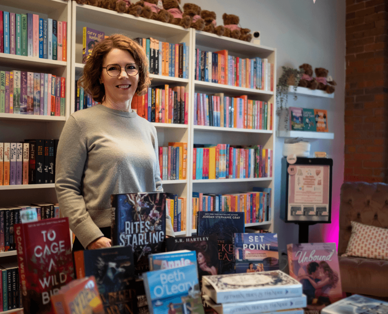 Paige Reynolds standing in a bookstore