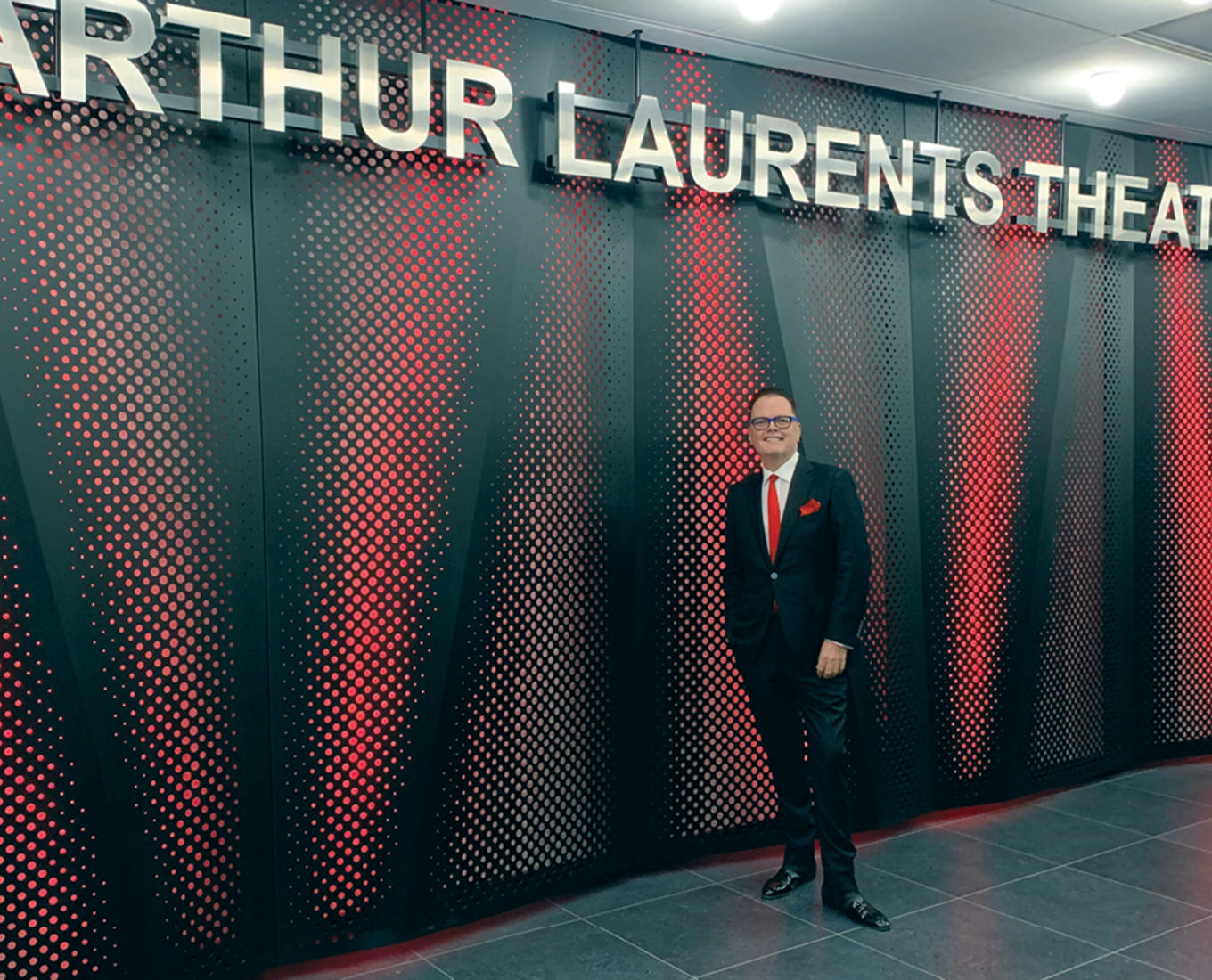 Saint stands in front of the new Arthur Laurents Theater at the George Street Playhouse in New Brunswick, New Jersey, his artistic home of 23 years.