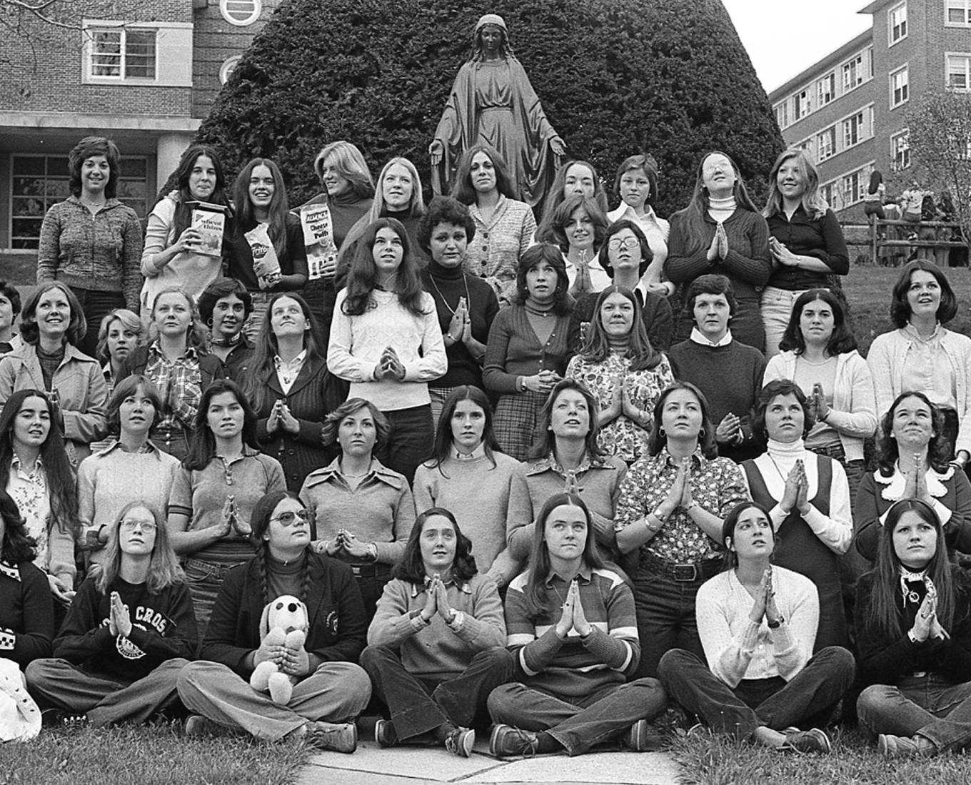 A large group of women pose for a photo