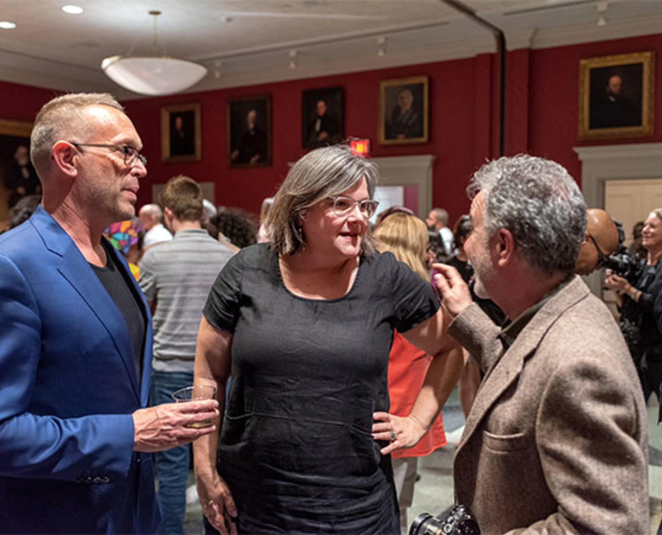 Stephanie Yuhl at the opening reception for "LGBTQ+ Worcester — For the Record," the exhibition she helped bring to life at the Worcester Historical Museum