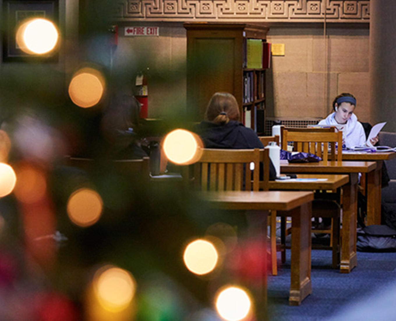Students in the library at Christmastime