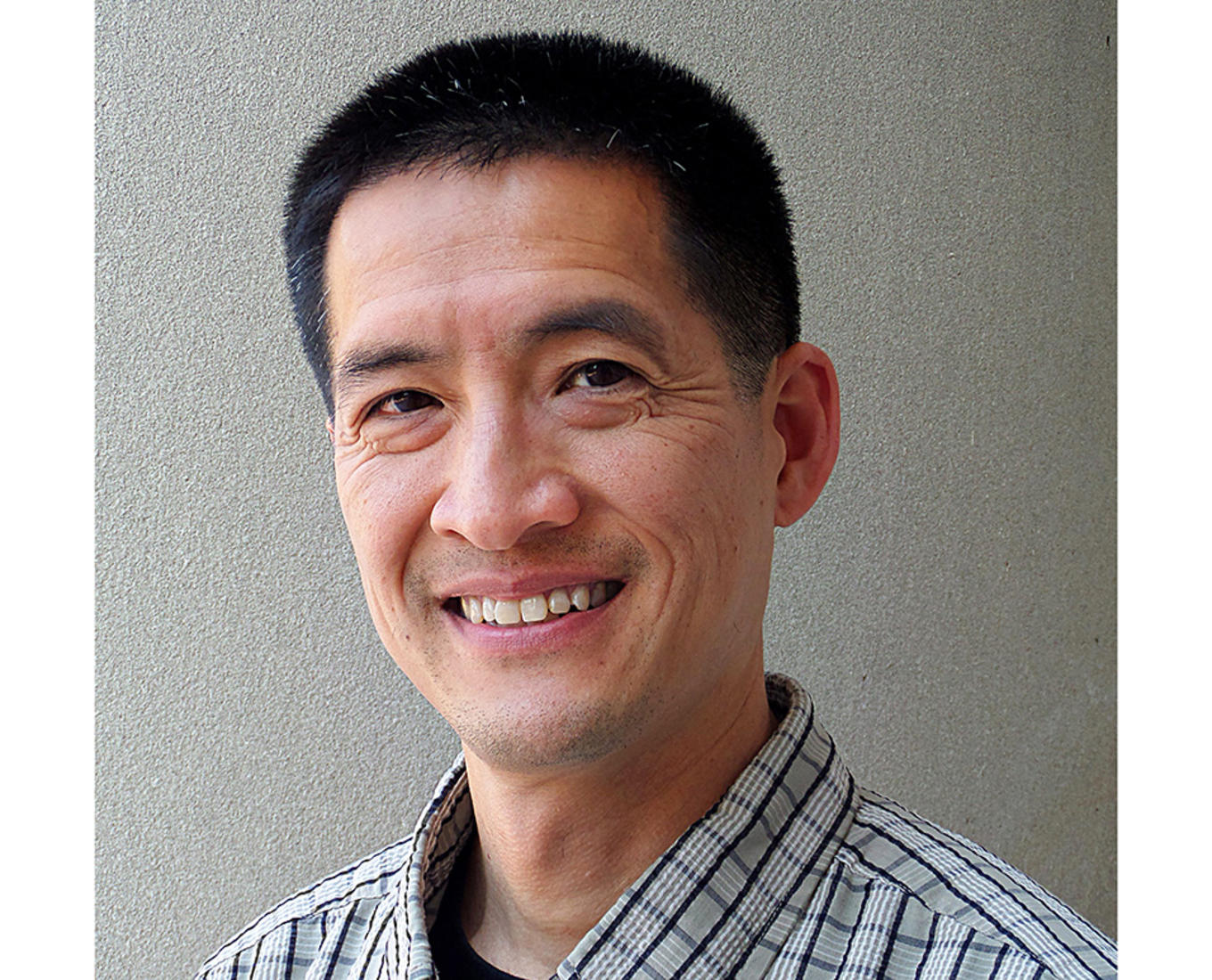 Headshot of Tat-siong Benny Liew.