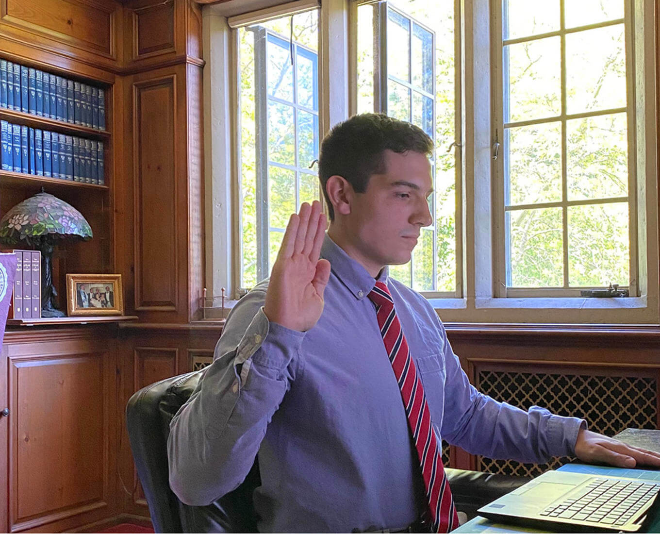 Rudy Antoncic '22 is sworn in remotely as a U.S. Federal Government Pathways intern.