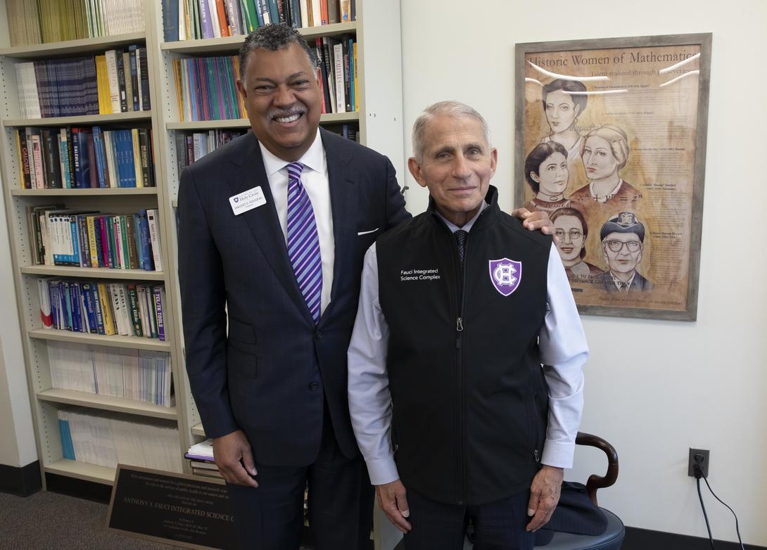Dr. Anthony Fauci standing next to Vincent Rougeau