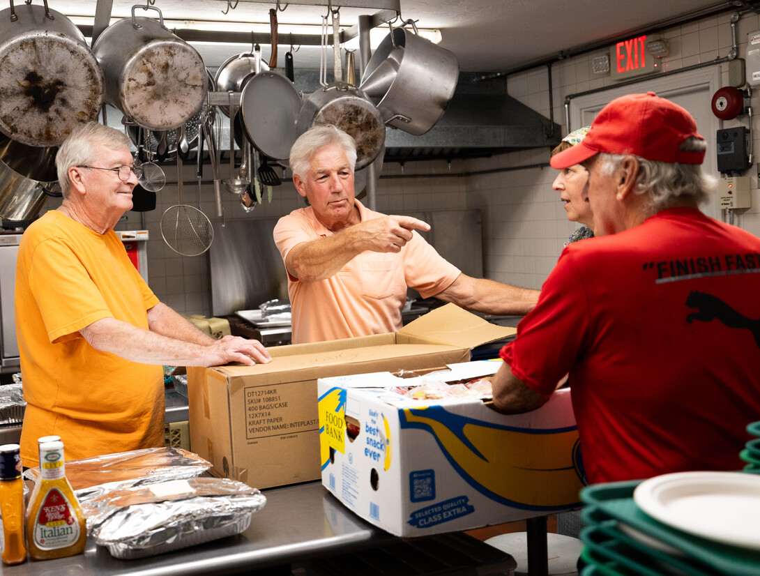 Frank Kartheiser and volunteers in the Mustard Seed kitchen